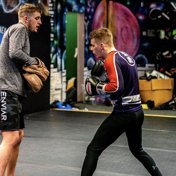 Kickboxing training on pads